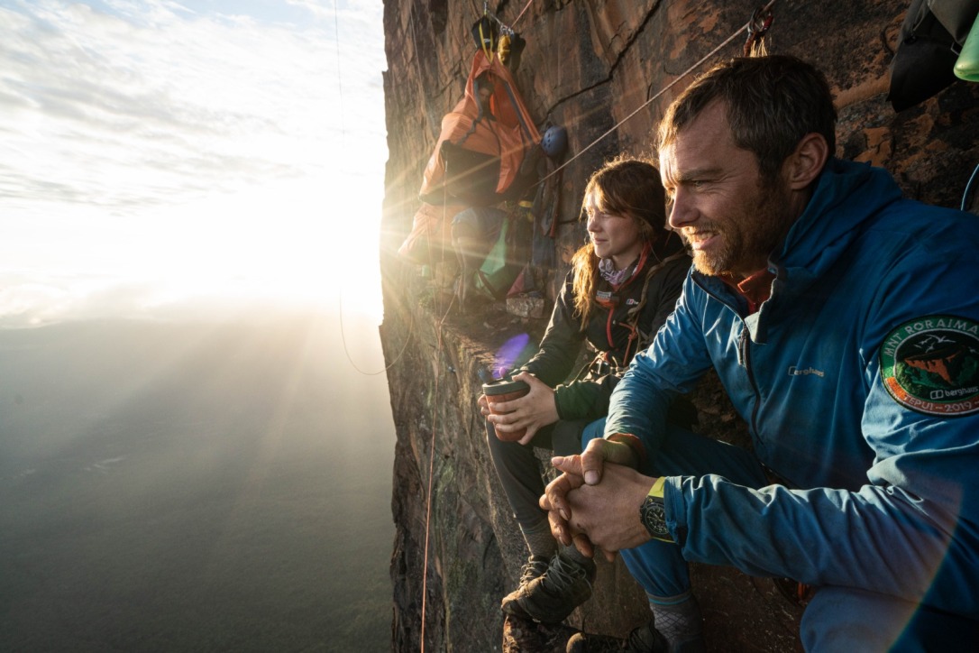 Anna and Leo enjoy the sun on the Invisible Ledge - photo Coldhouse Collective &amp; Berghaus